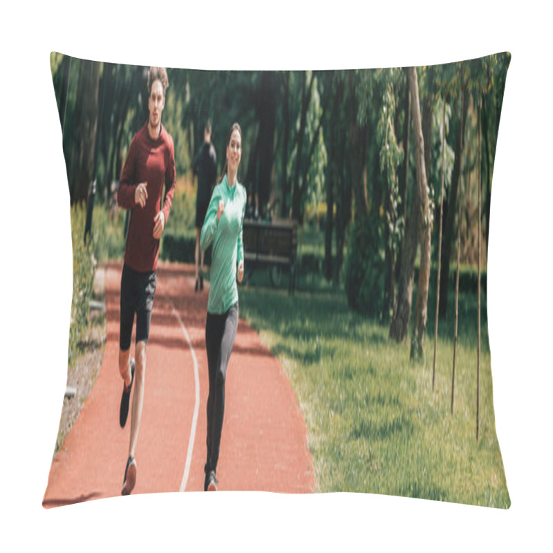 Personality  Panoramic Shot Of Smiling Woman Jogging Near Boyfriend On Running Track In Park  Pillow Covers