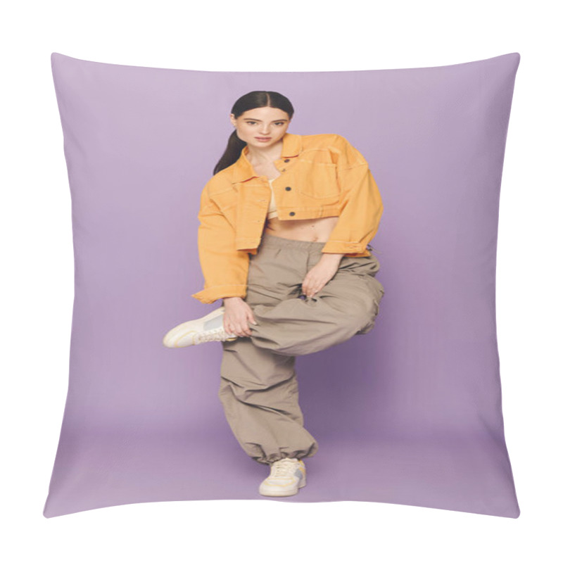 Personality  A Beautiful Woman Showcases Trendy Fashion While Playfully Posing With One Leg Raised. Pillow Covers