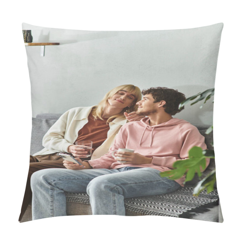 Personality  Two Men Sit Together On A Couch, Sharing Drinks And Smiles In A Warm, Inviting Space. Pillow Covers