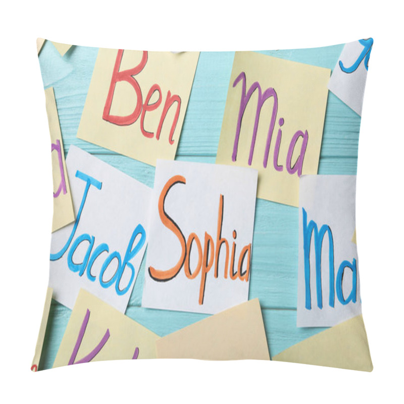 Personality  Paper Notes With Different Baby Names On Light Blue Wooden Table, Flat Lay Pillow Covers