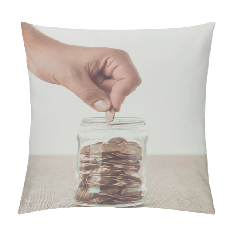 Personality  Cropped Image Of Man Putting Coin Into Glass Jar On Wooden Table, Saving Concept Pillow Covers