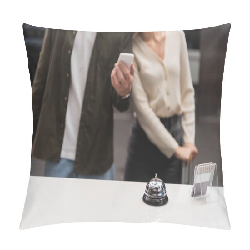 Personality  Service Bell And Card Holder On Reception Desk Near Cropped Couple With Smartphone On Blurred Background Pillow Covers