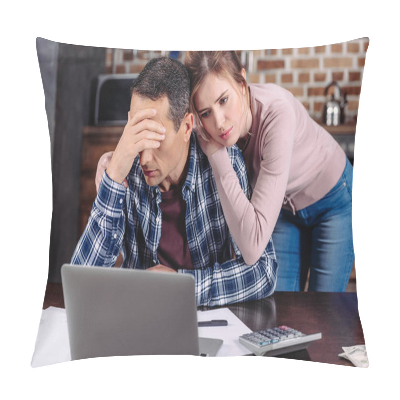 Personality  Portrait Of Woman Hugging Upset Husband That Sitting At Table With Laptop At Home, Financial Problems Concept Pillow Covers