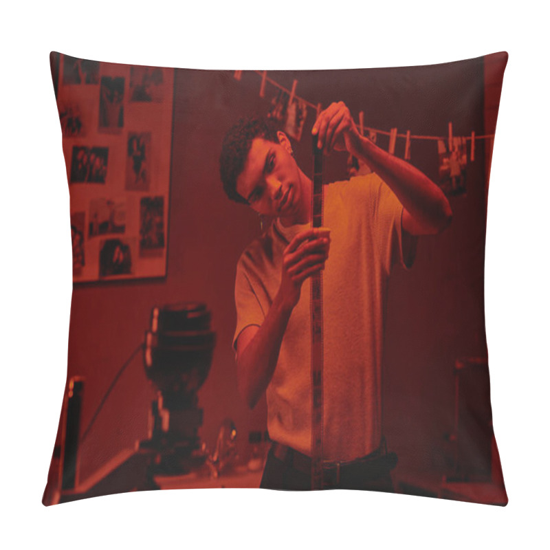 Personality  Focused African American Photographer Examines Developed Film Strip, Bathed In Red Darkroom Pillow Covers