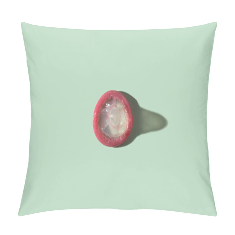 Personality  A Rolled-up Condom On A Green Background With A Blank Space Around It Pillow Covers