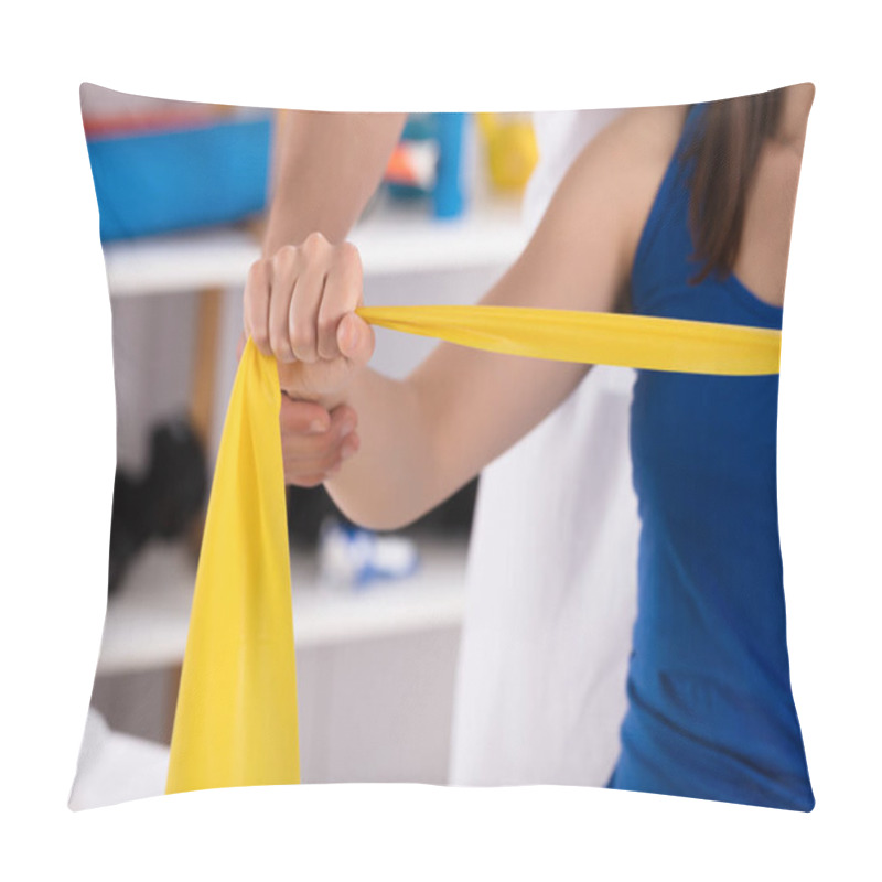 Personality  Physiotherapist Assisting Woman While Doing Exercise With Yellow Exercise Band Pillow Covers