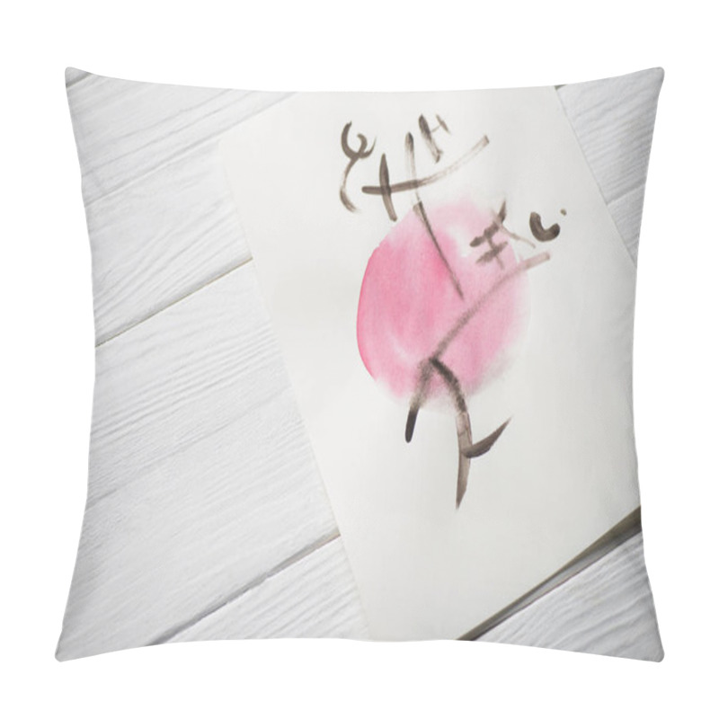 Personality  High Angle View Of Paper With Japanese Painting With Hieroglyphs On Pink Circle On Wooden Background Pillow Covers