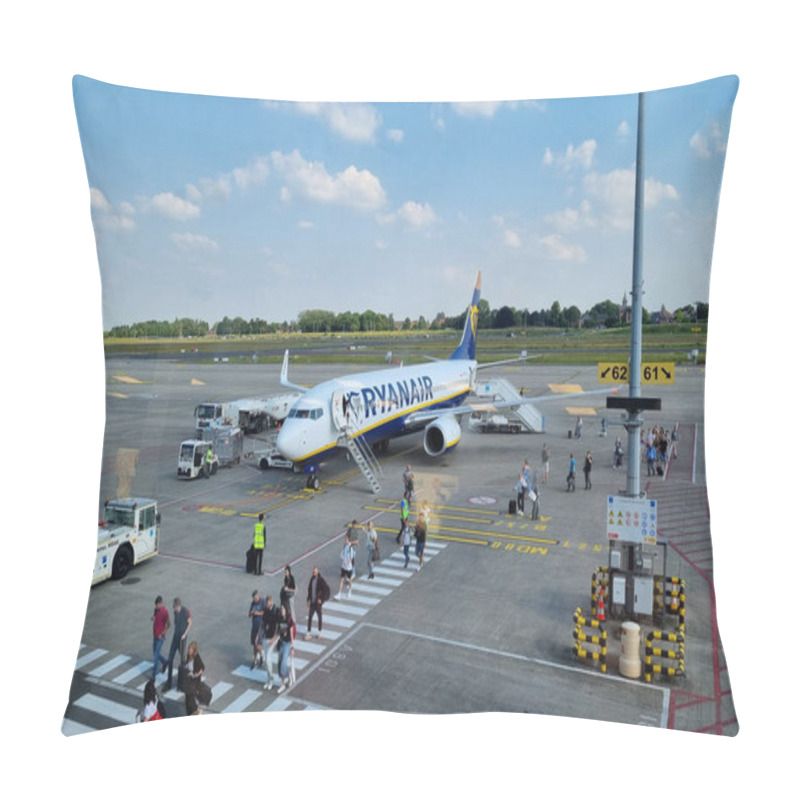 Personality  Brussels-Charleroi, Belgium, June 24, 2024: A Ryanair Aircraft Sits On The Airport Tarmac With Several Passengers Boarding Via An Airstair Under A Clear, Blue Sky. Ground Crew And Support Vehicles Prepare The Plane For Departure, With Runway Lights A Pillow Covers