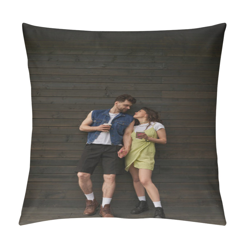 Personality  Full Length Of Fashionable Romantic Couple In Boots And Summer Outfits Holding Coffee To Go And Looking At Each Other While Standing Near Wooden House, Carefree Moments Concept Pillow Covers