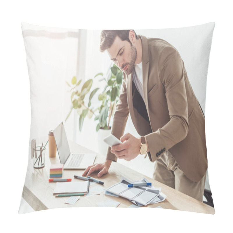 Personality  Side View Of Handsome Designer Using Smartphone While Developing User Experience Design In Office Pillow Covers