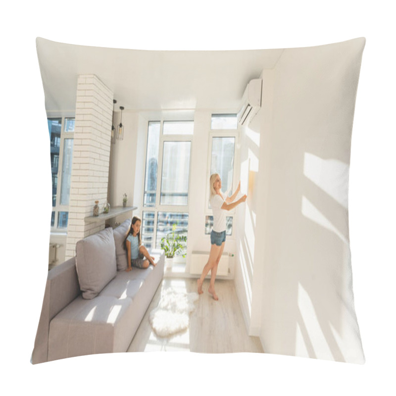 Personality  Mother And Daughter Hangs A Large Photo Canvas At Home Pillow Covers