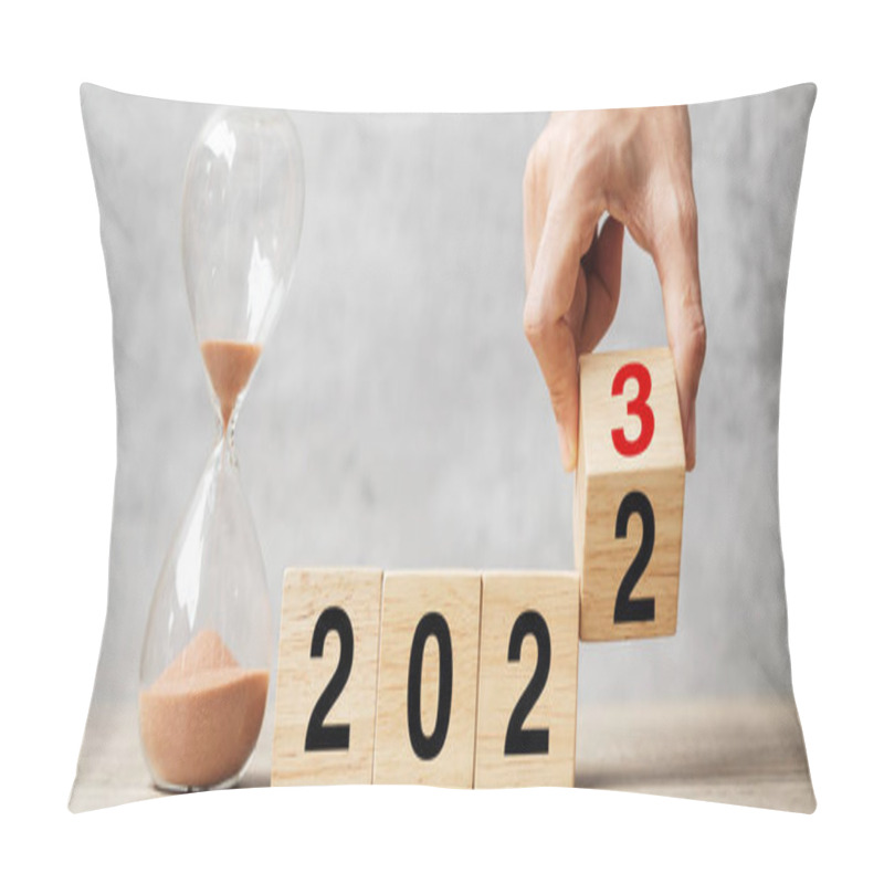 Personality  Hand Flipping Block 2022 To 2023 Text With Hourglass On Table. Resolution, Time, Plan, Goal, Motivation, Reboot, Countdown  And New Year Holiday Concepts Pillow Covers