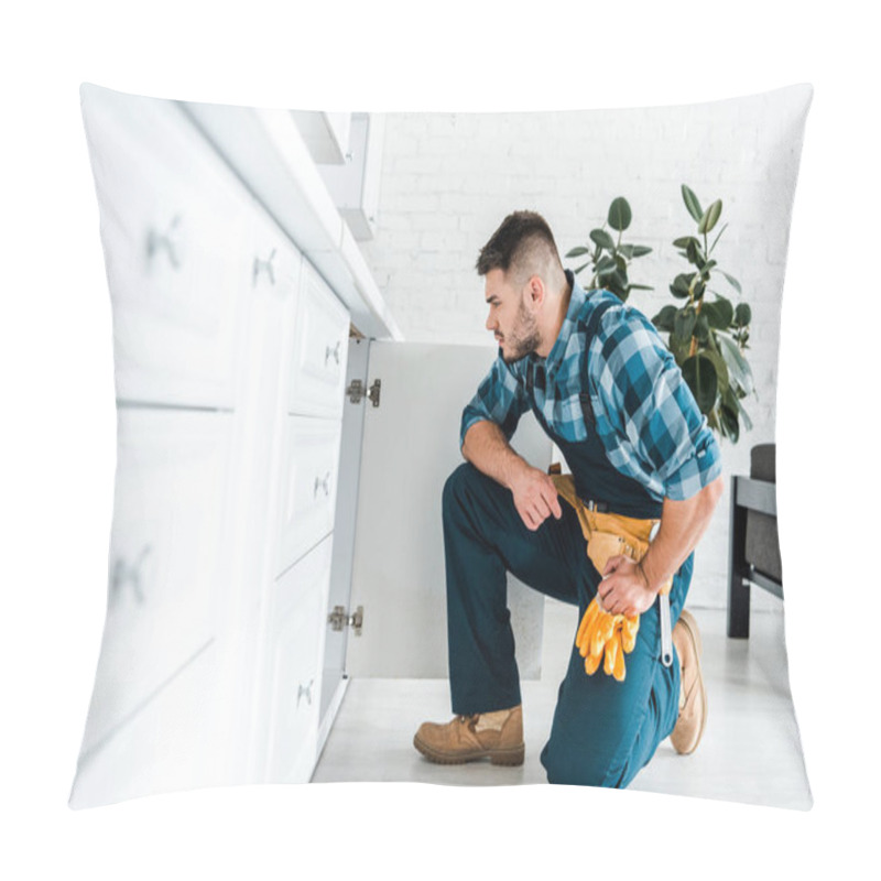 Personality  Selective Focus Of Handsome Handyman With Tool Belt Sitting Near Kitchen Cabinet Pillow Covers