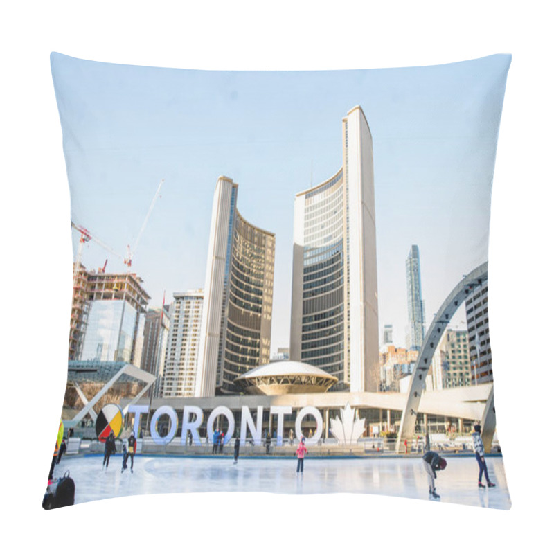 Personality  TORONTO, CANADA - JANUARY 23, 2021: PEOPLE SKAKE AT ICE RINK AT NATHAN PHILLIP SQUARE WITH 'TORONTO' SIGN BEHIND THEM DURING COVID-19 PANDEMIC. Pillow Covers