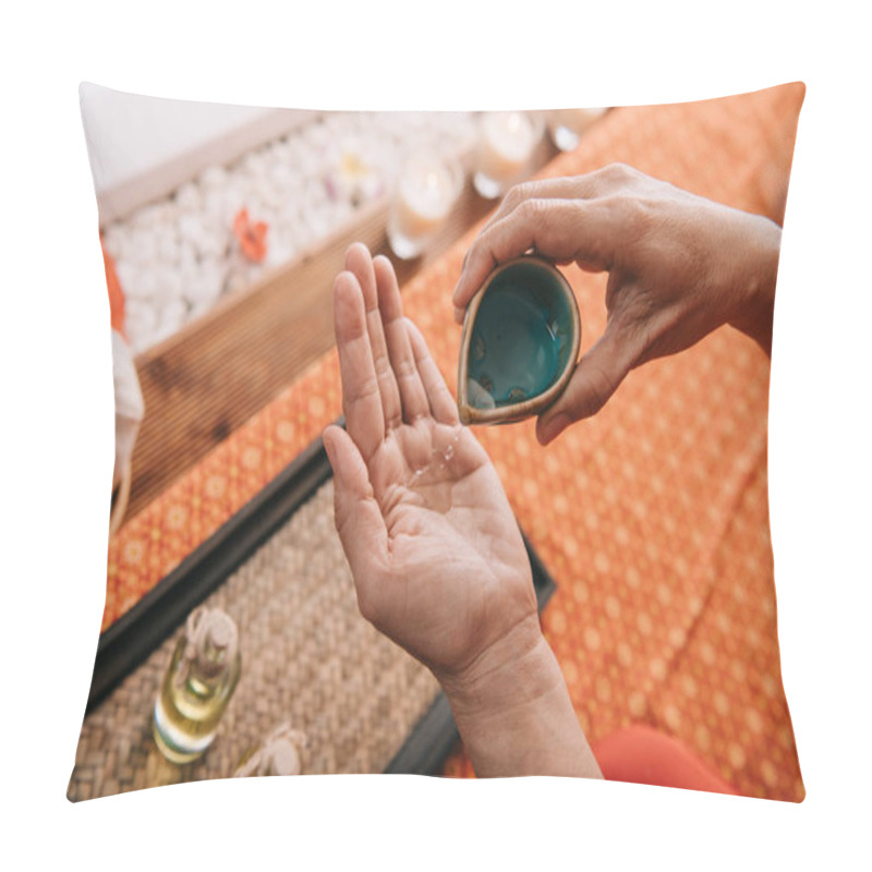 Personality  Cropped View Of Masseur Pouring Fragrance Oil On Hand Pillow Covers