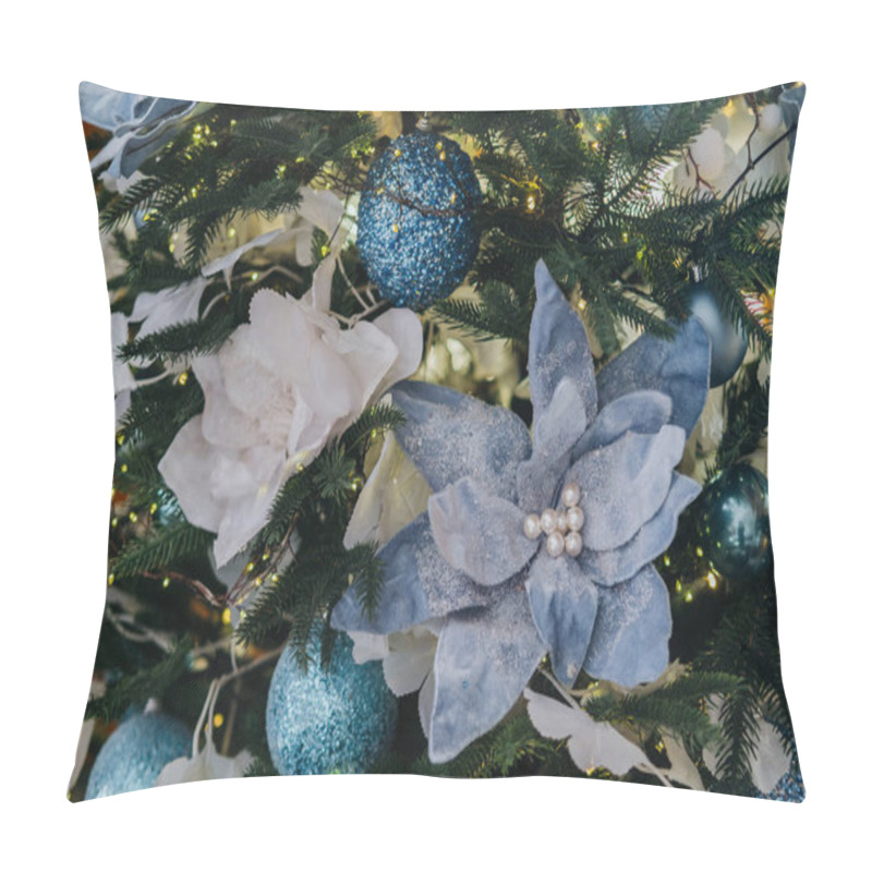 Personality  A Beautifully Decorated Christmas Tree Features Intricate Blue Ornaments And Delicate Flower Accents. The Festive Arrangement Creates A Warm And Inviting Holiday Atmosphere. Pillow Covers