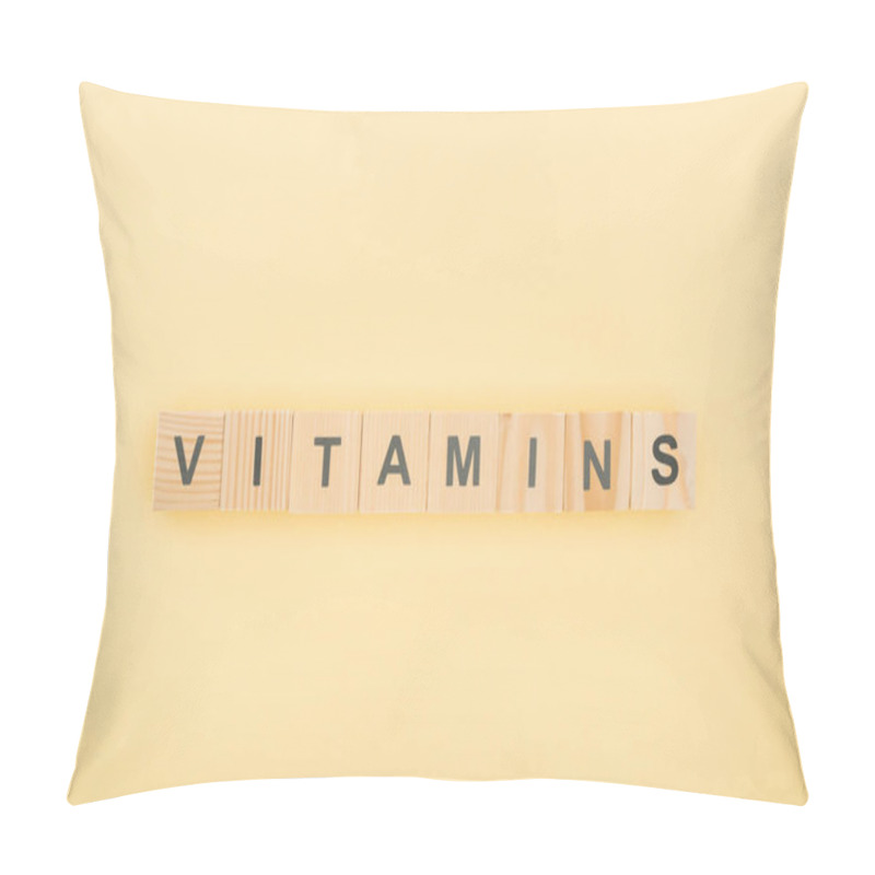 Personality  Top View Of Vitamins Lettering Made Of Wooden Cubes On Yellow Background Pillow Covers