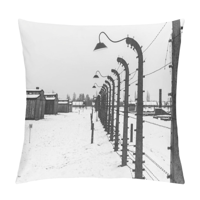 Personality  Oswiecim, Poland - February 16, 2018: Electrified Barbed Wire Fence Of Auschwitz Concentration Camp. The Remains Of The Camp Oaan The Background Pillow Covers