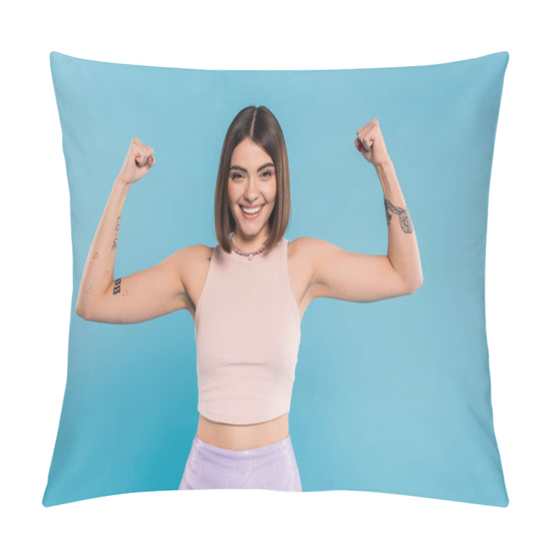 Personality  Women Power, Cheerful Young Woman With Short Hair, Tattoos And Nose Piercing Showing Muscles On Blue Background, Generation Z, Displeased, Casual Attire, Strength  Pillow Covers