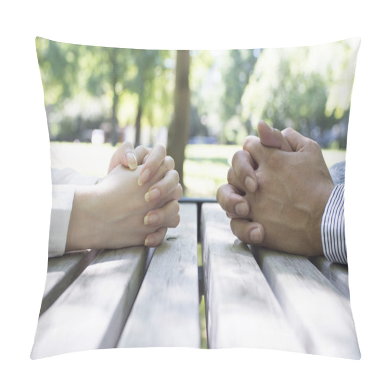 Personality  Man And Woman Sits At A Wood Desk With Hands Clasped Pillow Covers