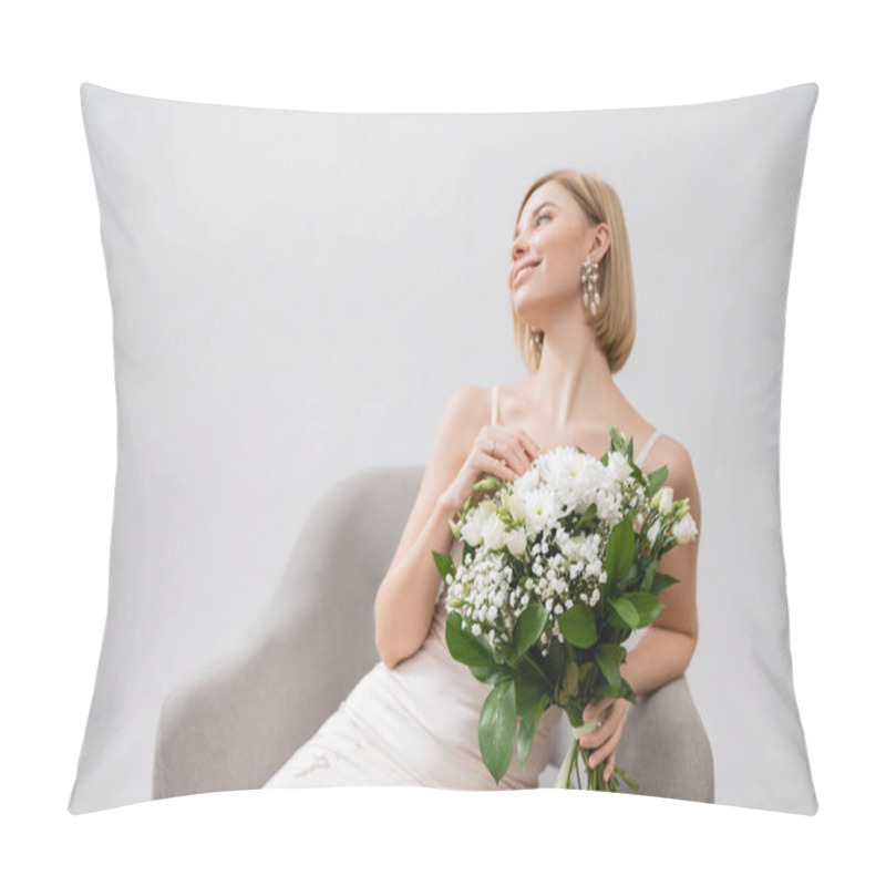 Personality  Special Occasion, Happy Blonde Bride In Wedding Dress Sitting In Armchair And Holding Bouquet On Grey Background, Engagement Ring, White Flowers, Bridal Accessories, Happiness, Feminine  Pillow Covers