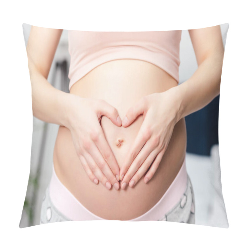 Personality  Cropped Shot Of Pregnant Woman Touching Belly And Showing Hand Heart Symbol Pillow Covers