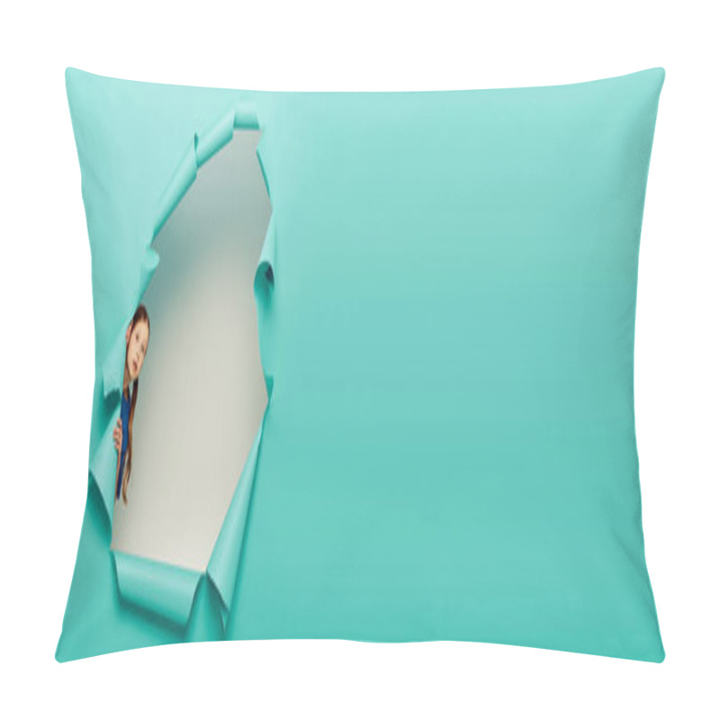 Personality  Feared Preteen Red Haired Girl Looking At Camera While Standing Behind Hole In Blue Paper And Celebrating Child Protection Day On White Background, Banner  Pillow Covers