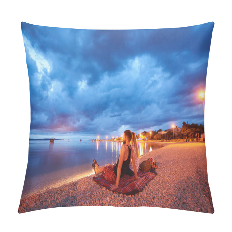 Personality  Bearded Man And Long-haired Woman Sitting On Rug On Resort Town Pebble Beach At Dusk Enjoying View Of Cruise Boats Floating In Calm Blue Water And Dramatic Cloudy Evening Sky. Tourism And Vacations. Pillow Covers