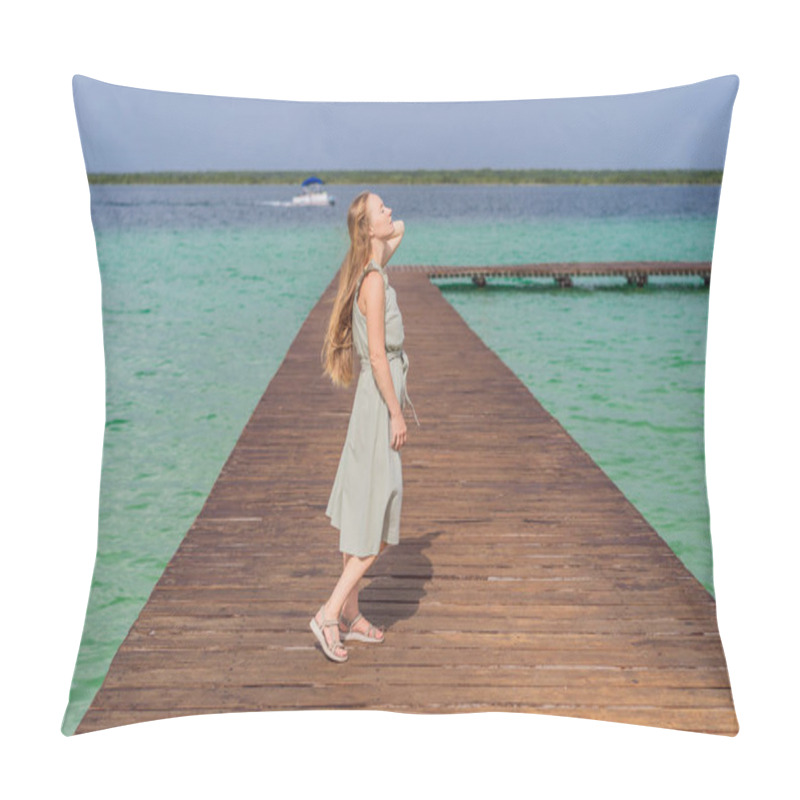 Personality  Female Tourist In A Turquoise Dress Standing On A Wooden Pier Over The Turquoise Waters Of Bacalar Lake, Mexico. Peaceful Tropical Travel Destination Concept. Pillow Covers