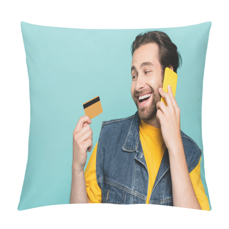 Personality  Smiling Man Talking On Mobile Phone And Looking At Credit Card Isolated On Blue Pillow Covers