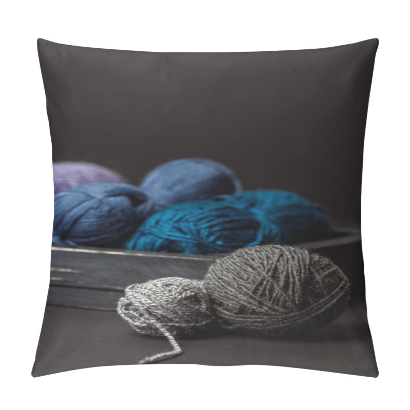 Personality  Close Up View Of Grey, Purple And Blue Knitting Clews In Wooden Box On Black Background Pillow Covers