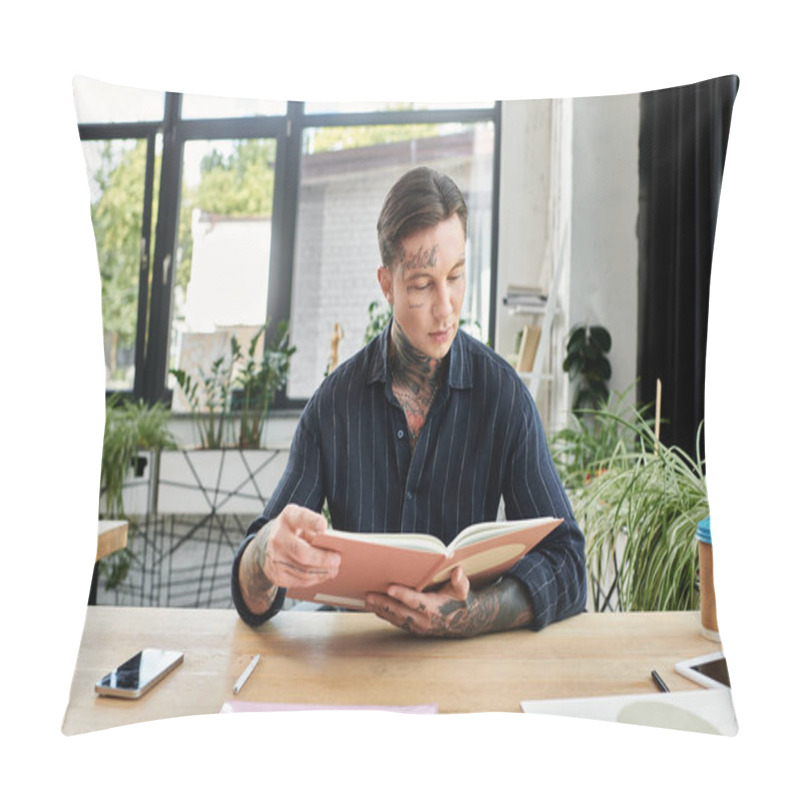 Personality  A Coworker Studies A Book Intently While Surrounded By A Vibrant Office Atmosphere. Pillow Covers