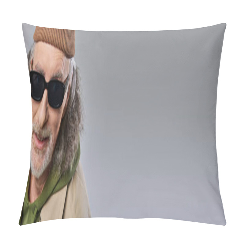 Personality  Expressive Individuality, Portrait Of Smiling Senior Man In Beanie Hat, Dark Stylish Sunglasses And Beige Trench Coat Smiling At Camera On Grey Background, Positive Aging, Banner With Copy Space Pillow Covers