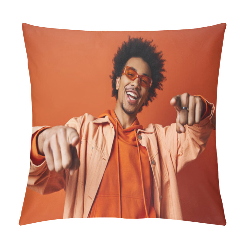 Personality  Stylish African American Man In Orange Shirt And Sunglasses Pointing Towards Camera On Vibrant Orange Background. Pillow Covers