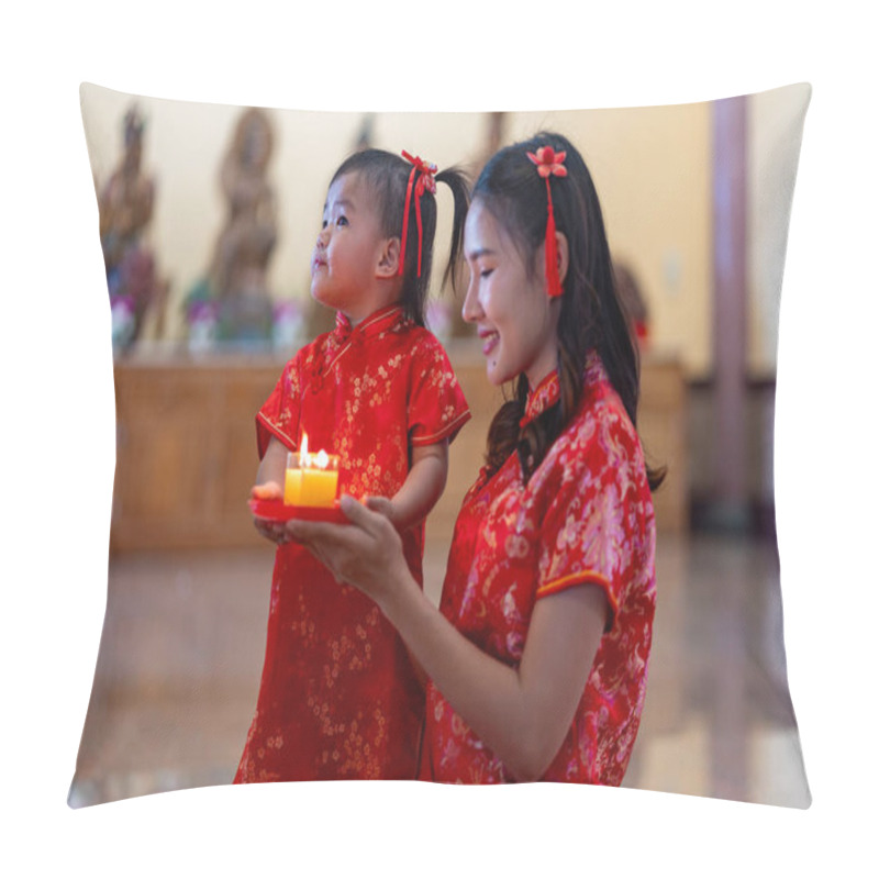 Personality  Young Mother And Little Daughter In Traditional Red Cheongsam Kneels In Prayer, Holding Lit Candles In Temple On Chinese New Year. Spiritual, Cultural Significance Of Lunar New Year Celebrations Pillow Covers