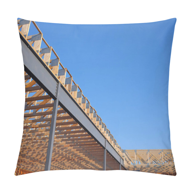 Personality  A Partially Constructed Building Featuring A Combination Of Steel Beams And Wooden Trusses, Showcasing Modern Architectural Design And Construction Techniques Under A Clear Blue Sky. Pillow Covers