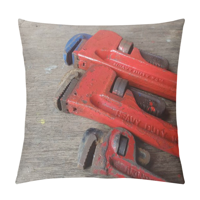 Personality  Two Weathered Red Pipe Wrenches Rest On A Rustic Wooden Surface, Showcasing Their Heavy-duty Construction.  Industrial Tools Concept. Pillow Covers