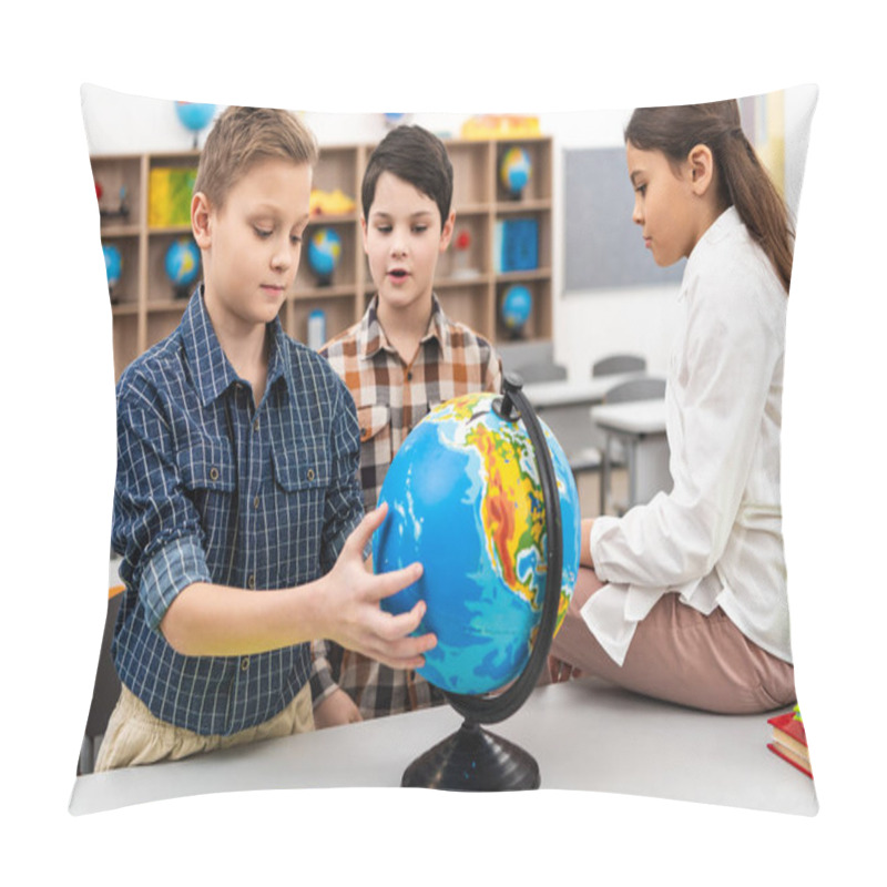 Personality  Three Cheerful Pupils Playing With Globe In Classroom During Geography Lesson Pillow Covers