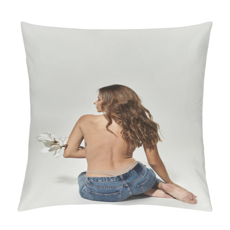 Personality  A Graceful Young Woman Poses, Holding A Flower Against A Soft Backdrop. Pillow Covers