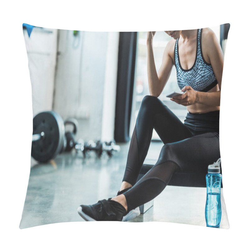 Personality  Cropped View Of Sportswoman Sitting On Step Platform And Using Smartphone  Pillow Covers