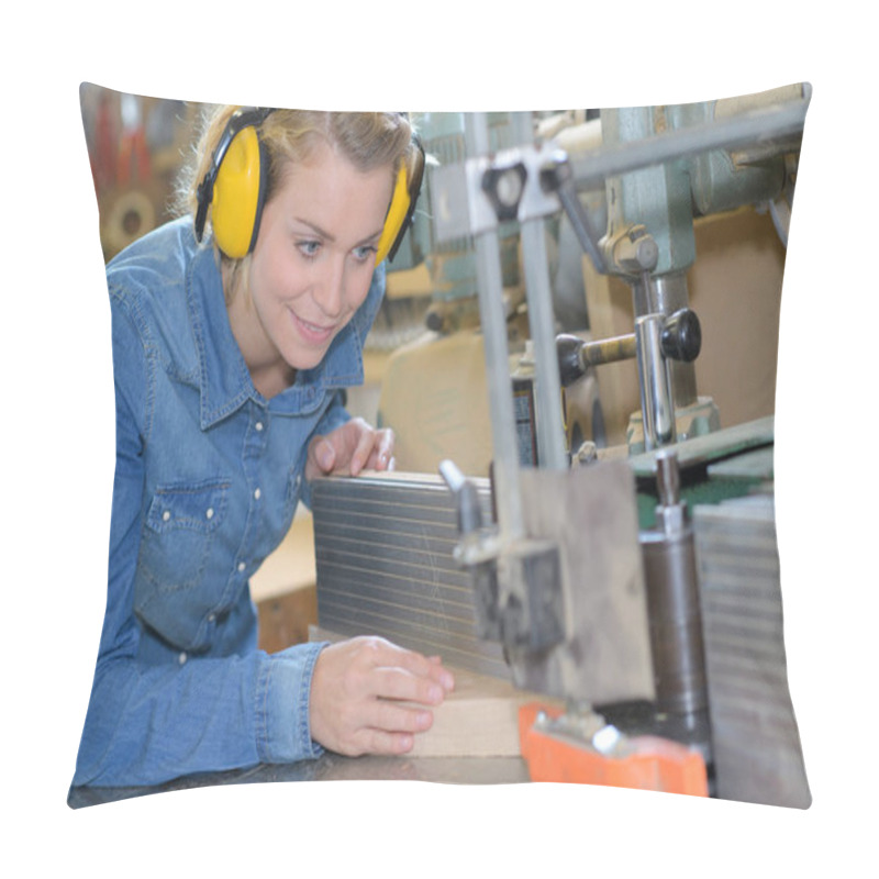 Personality  Young Female Carpenter In Safety Equipment Cutting Wood In Workshop Pillow Covers