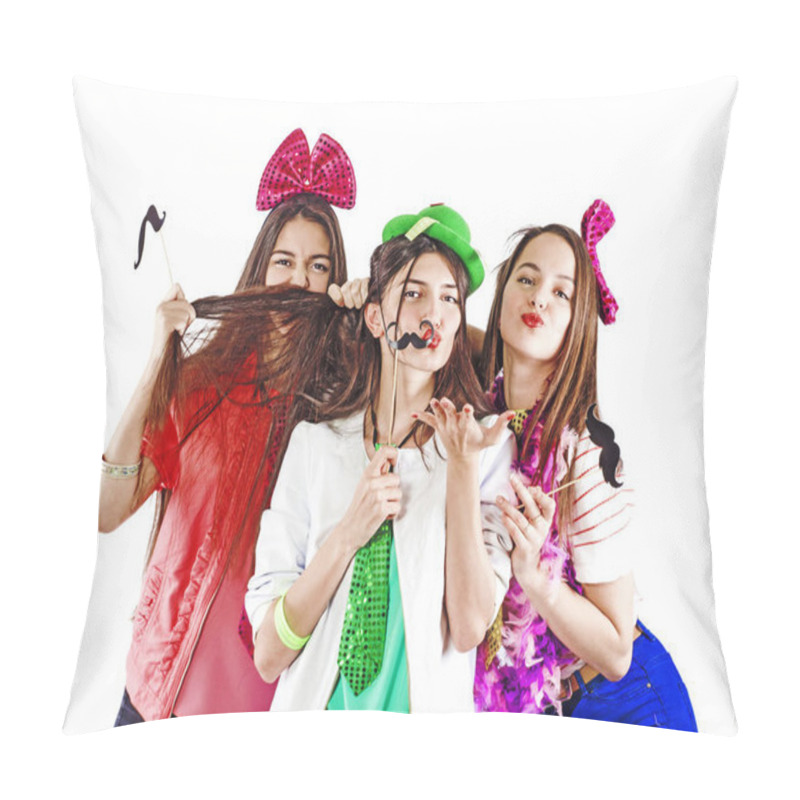 Personality  Girls Enjoy Doing Silly On White Background. They Make Jokes And Grimaces, Enjoying The Holiday. They Are Friends, And They Imitate The Mustache With Their Hair Pillow Covers