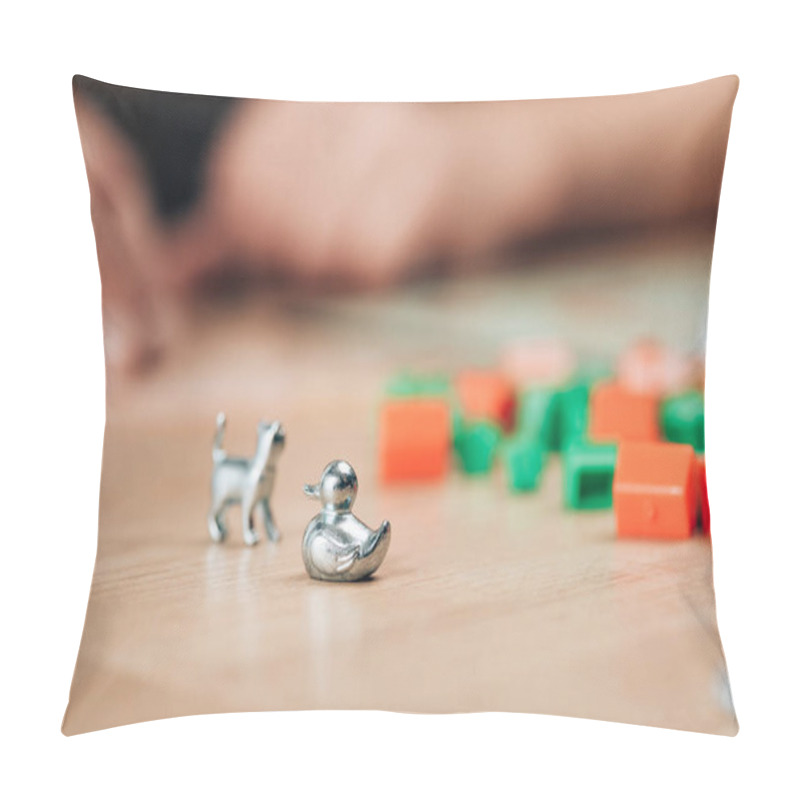 Personality  KYIV, UKRAINE - NOVEMBER 15, 2019: Selective Focus Of Playing Figures Of Monopoly Game On Wooden Table Pillow Covers