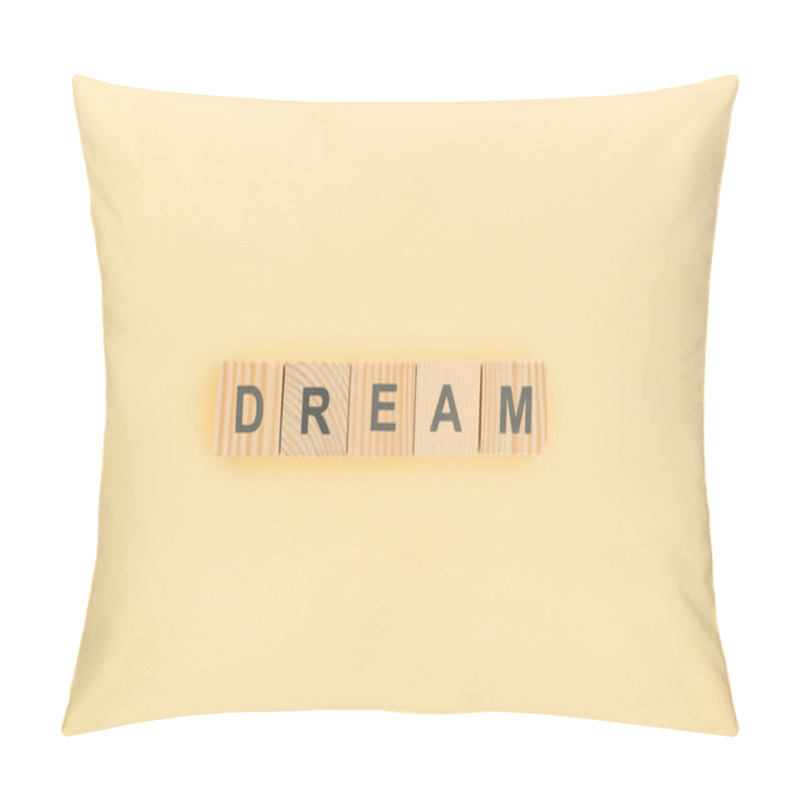 Personality  Top View Of Dream Lettering Made Of Wooden Cubes On Yellow Background Pillow Covers