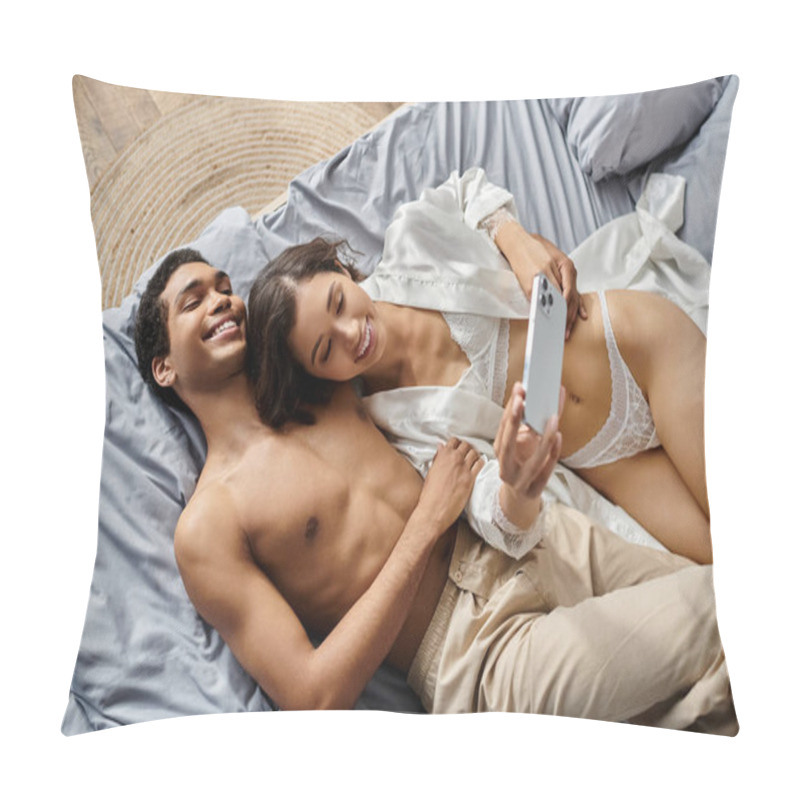 Personality  A Young Multicultural Couple Lies In Bed Together, Smiling And Taking A Selfie With A Smartphone. Pillow Covers