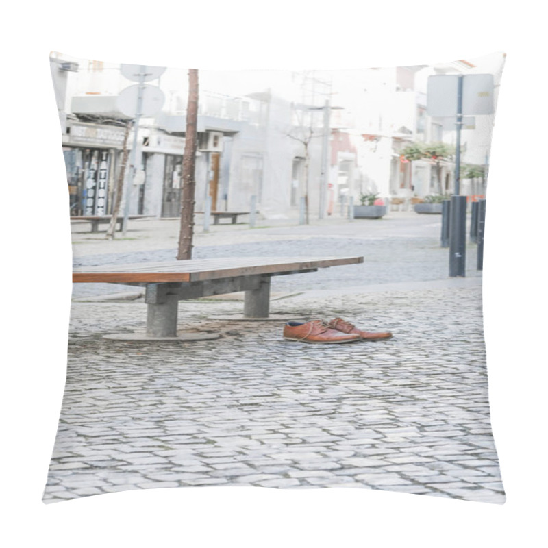 Personality  Brown Leather Shoes On A Cobblestone Pavement Next To A Bench In An Urban Setting. Pillow Covers