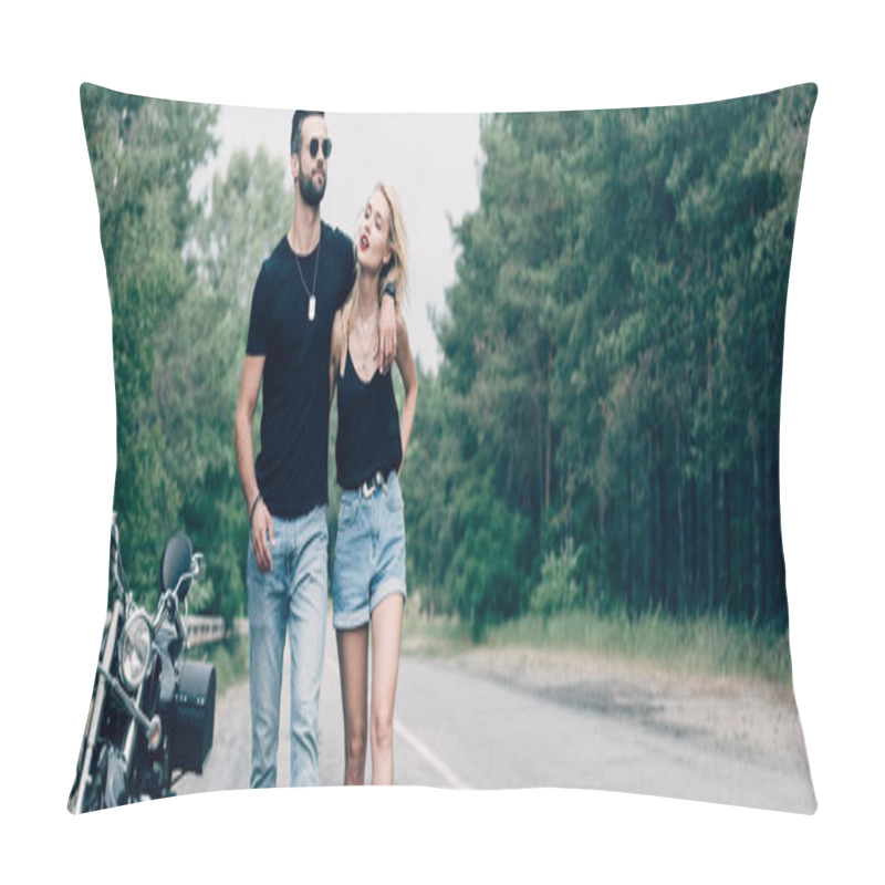 Personality  Young Attractive Couple Of Bikers Walking Along Road And Embracing Near Black Motorcycle, Panoramic Shot Pillow Covers