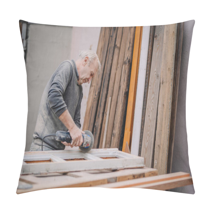 Personality  An Elderly Man Is Sanding A Wooden Window Frame Using A Power Tool In A Workshop, Surrounded By Various Wooden Planks. Pillow Covers