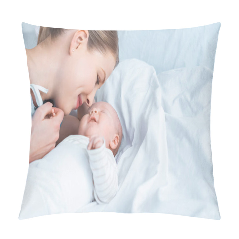 Personality  Smiling Young Mother Holding Hand Of Adorable Newborn Baby Lying On Bed  Pillow Covers