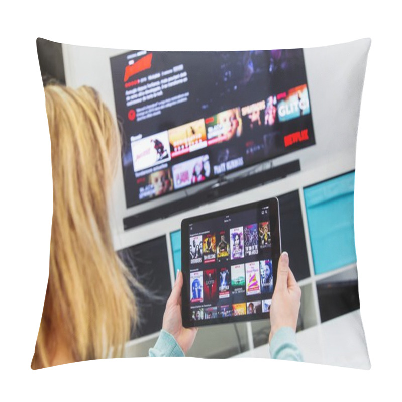 Personality  Woman Holding A Touch Pad And Switching Channels On France Netflix HomePage. With TV Set On Background. Pillow Covers